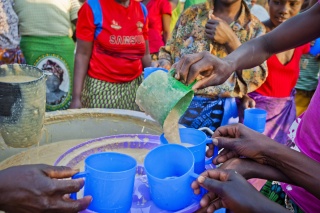 Volunteers serve food